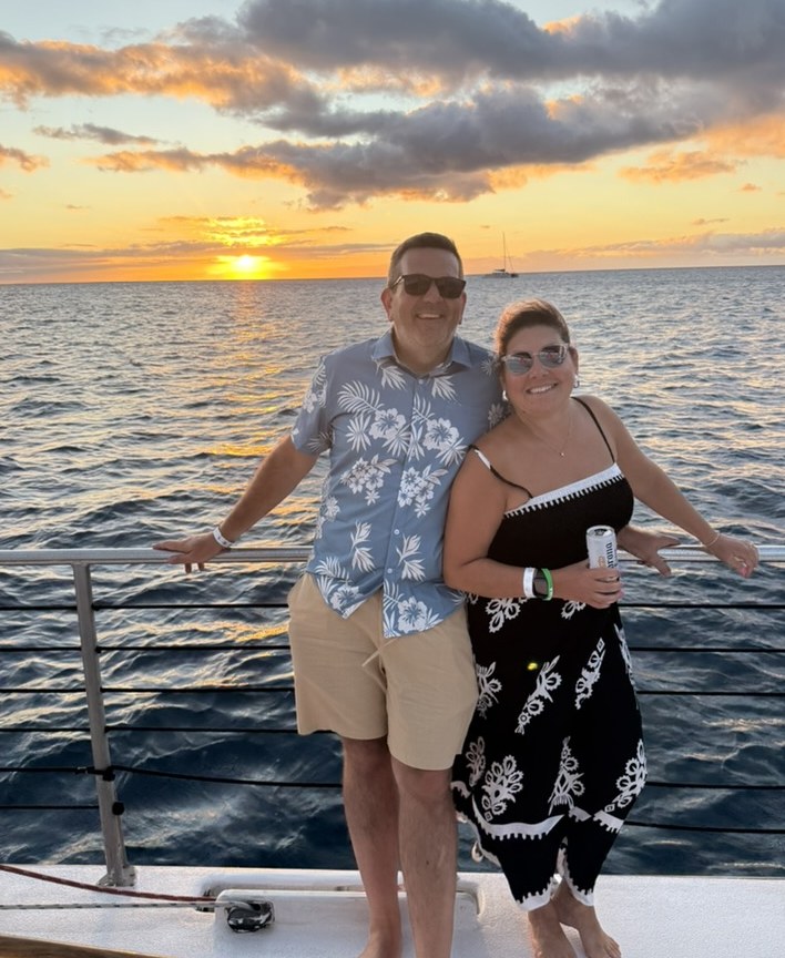 Carrolyn and Bill on a sunset sail in Hawaii